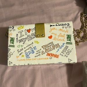 little white with colorful sentences hangbag